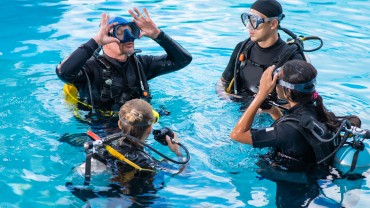 People learn to dive with an instructor at Achi Divers